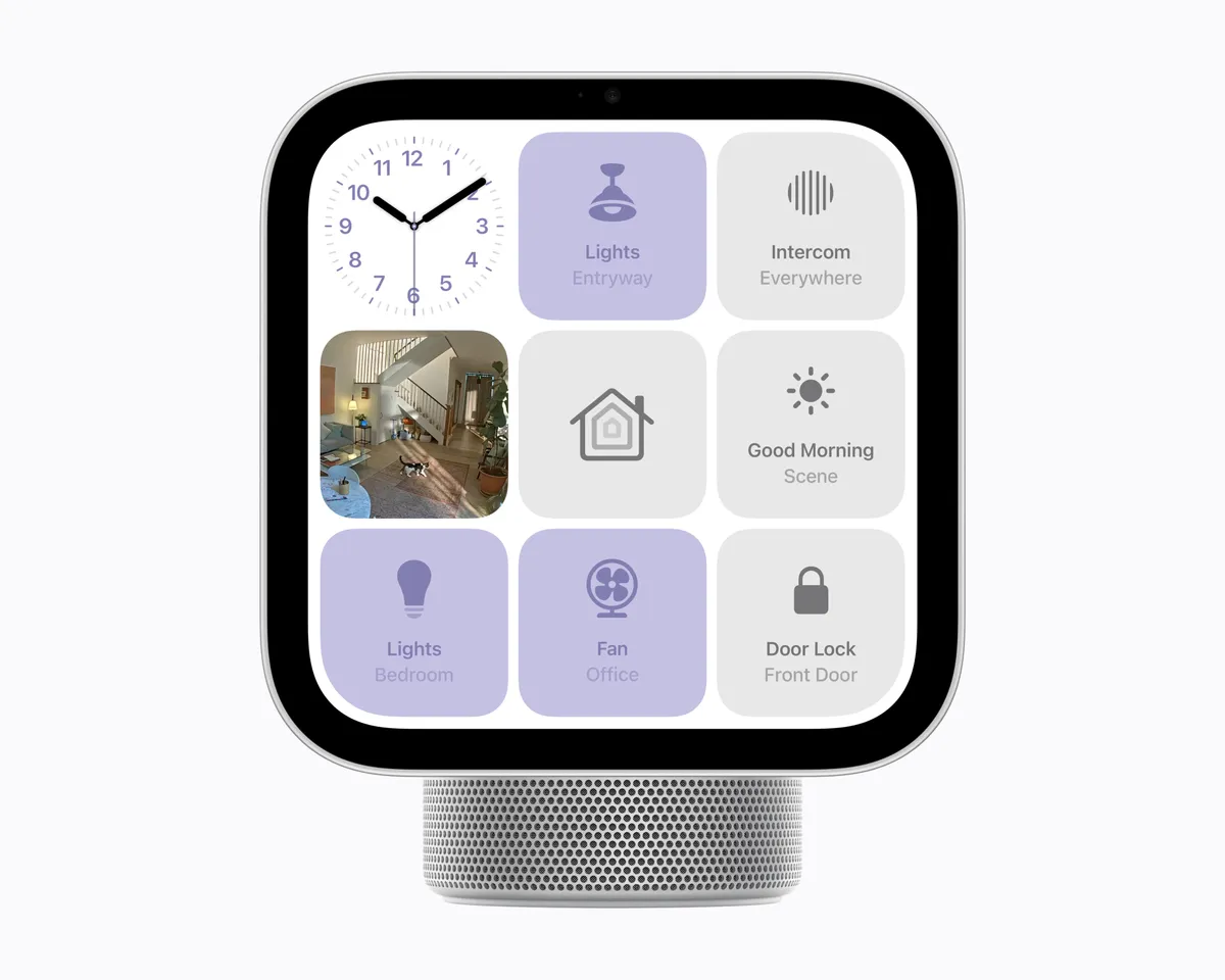 Apple HomeView showing a grid of smart home controls, including lights, intercom, a fan, a front door lock and a camera feed tile