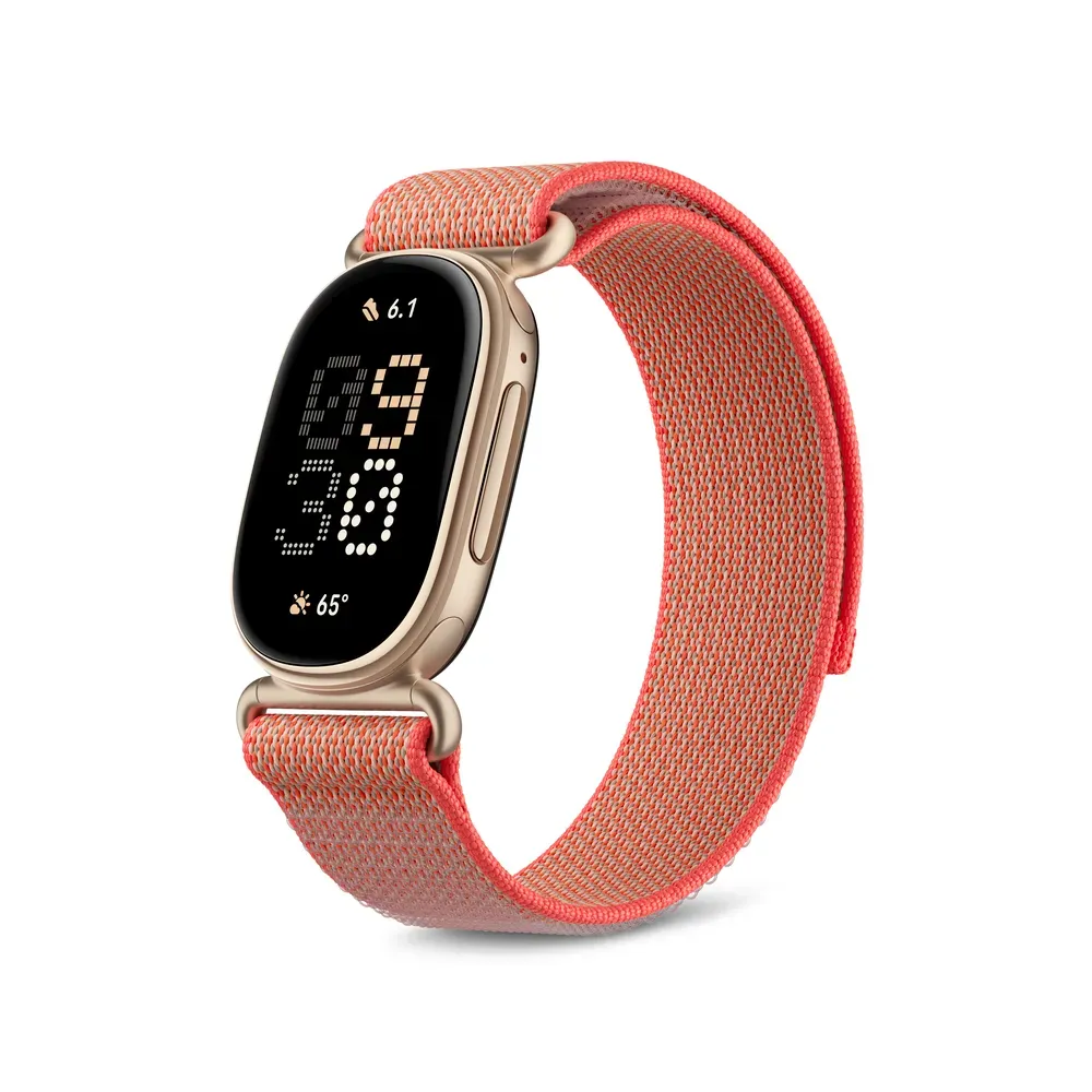 Fitbit Edge in Canyon (warm gold case) on a coral Performance Loop band
