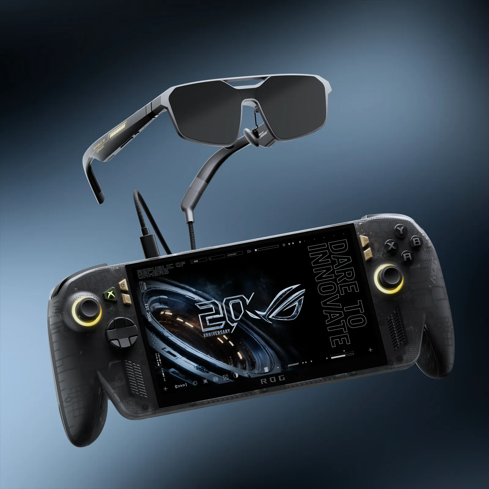 The ROG Xbox Ally X20 in translucent black with gold accents, its screen showing a '20' anniversary graphic, beneath the ROG XREAL R1 AR glasses from the $2,499 bundle