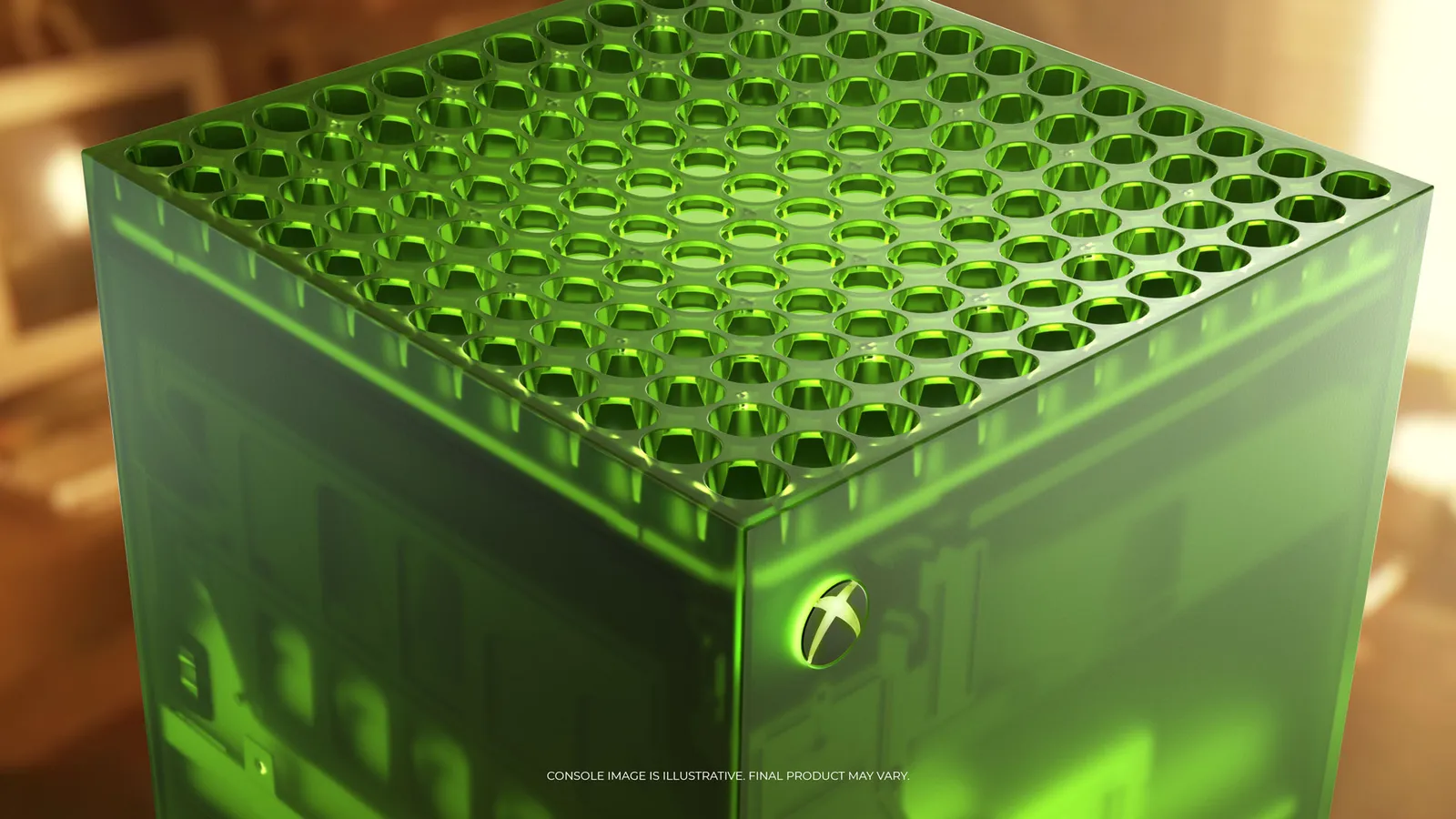 Close-up of the top corner of the translucent green Xbox Series X25, showing its round vent grid and the glowing Xbox logo on the front